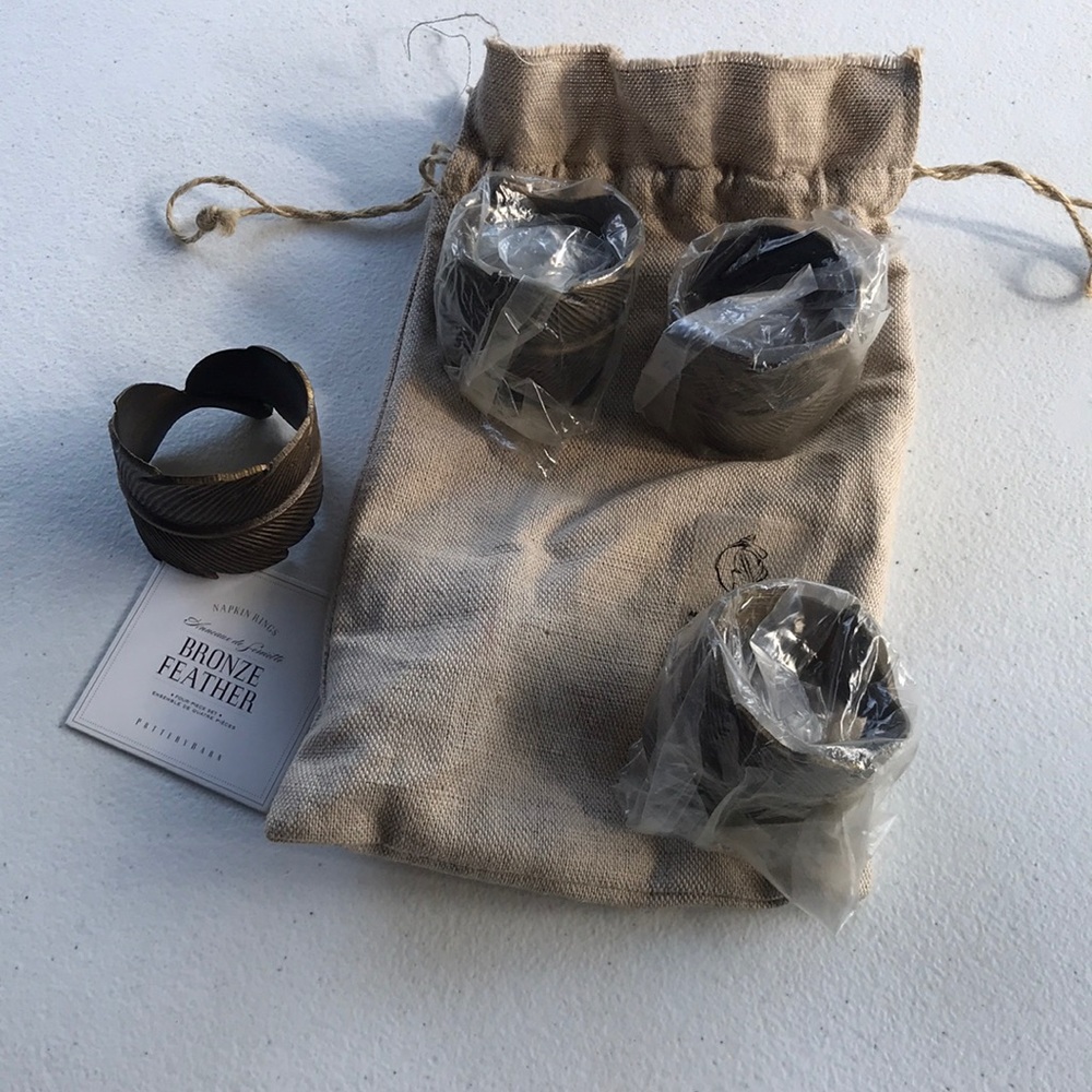 Pottery barn set of 4 bronze feather napkin rings
